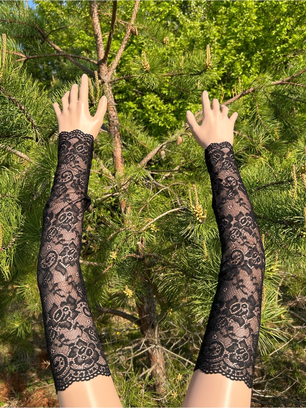 Black Gothic lace fingerless gloves with a floral lace design